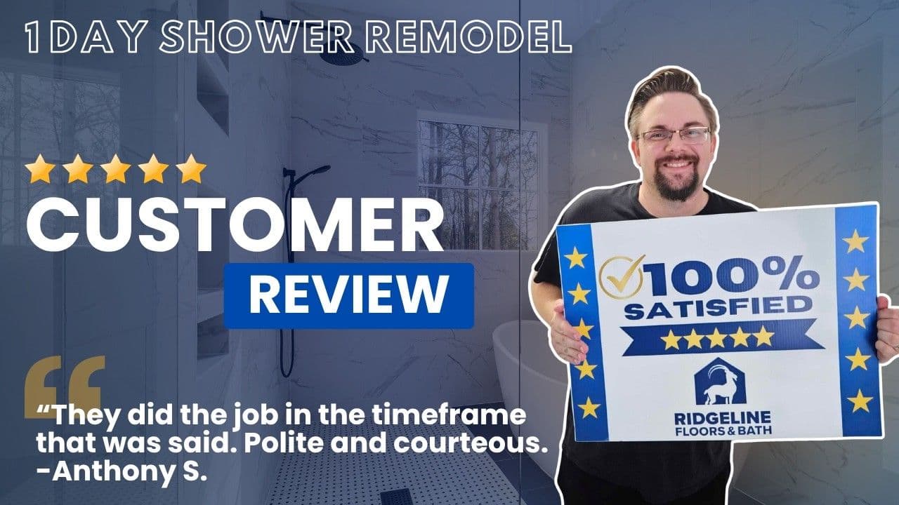Man holding 100% satisfied customer review certificate for Ridgeline Floors & Bath shower remodel, with five-star rating and testimonial from Anthony S
