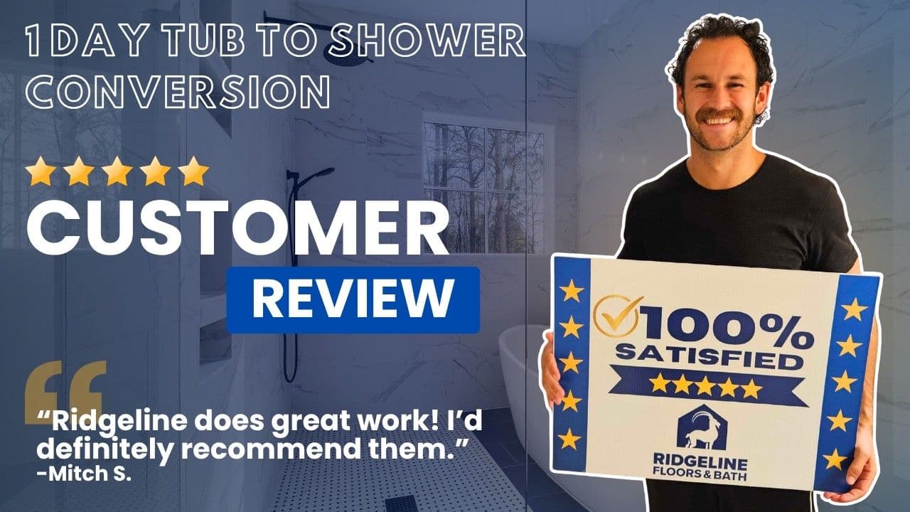 Man holding 100% satisfied badge for Ridgeline Floors & Bath tub to shower conversion service with five-star customer review quote from Mitch S.