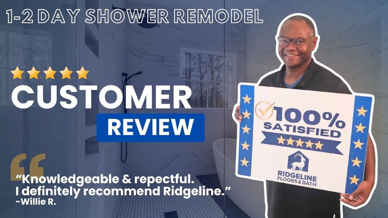 Man holding 100% satisfied five-star review sign for Ridgeline Floors and Bath shower remodel, with customer testimonial praising knowledgeable and respectful service